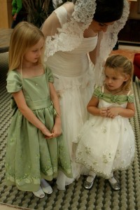 A special moment with the flower girls- they might remember it forever, or might go in one ear and out the other.